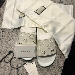 Gucci Rubber GG Monogram Slide Sandals in white rubber, water-resistant, size 8